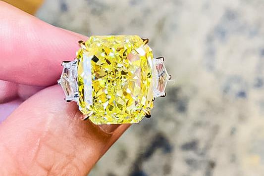 GIA Certified 34.00 Carat Fancy Intense Yellow Diamond Ring