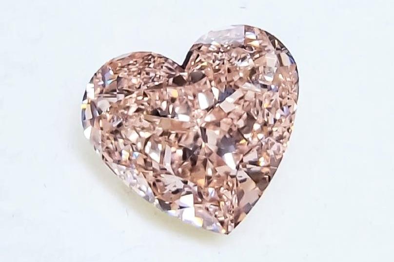 Gia Certified Fancy Intense Orangey Pink Heart Shape Diamond