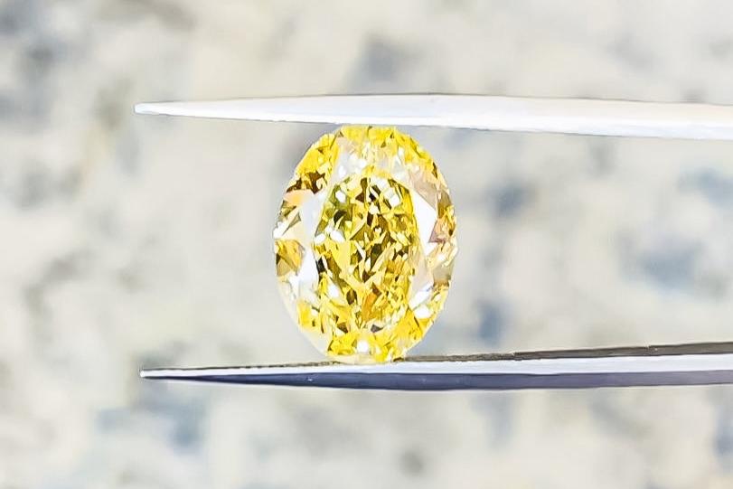 GIA Certified 5.00 Carat Vivid Yellow Diamond Ring